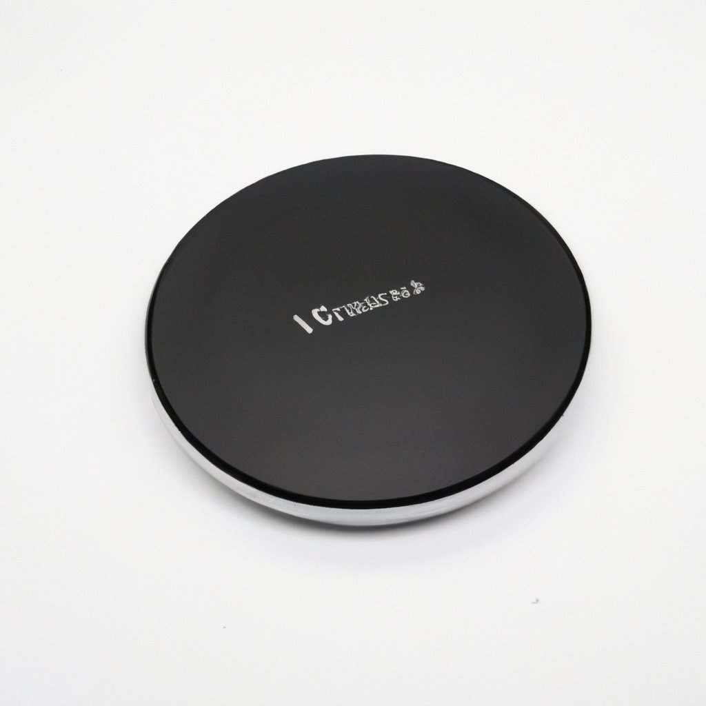 Black wireless charging pad with sleek design and fast charging capabilities. Compatible with various devices for convenient and cord-free charging on-the-go.